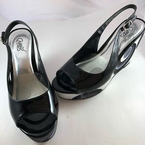 Carlos Sz 8 1/2 Black peep toe platform wedges.